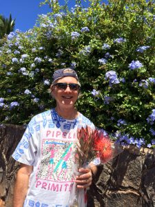 Jeff carrying flowers
